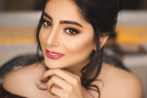 model in festive party makeup and updo